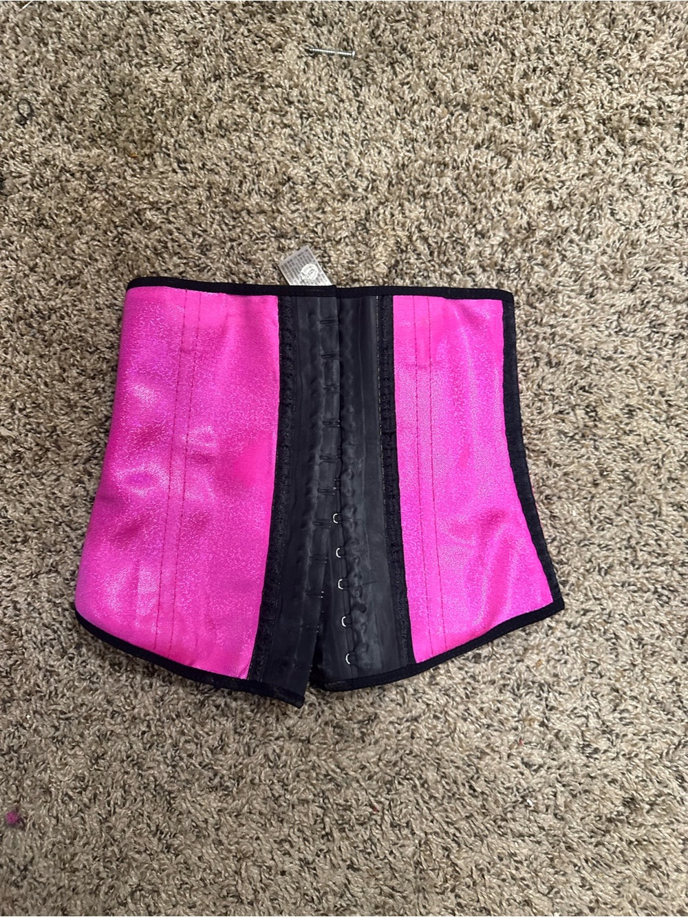 Label showing Ann Chery brand on black garment
